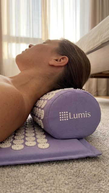 Person using Lumis Mat